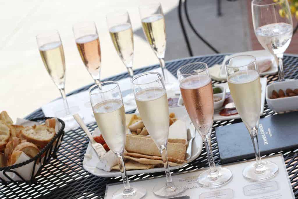 two tasting flights of sparkling wine with four glasses each