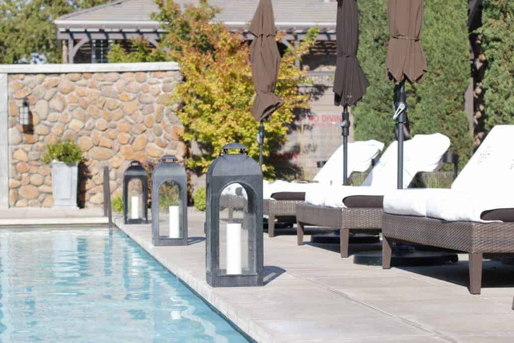 lounge chairs by the outdoor pool at hotel yountville