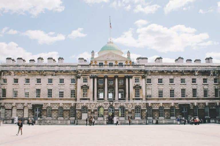 exterior gates and building of Buckingham Palace in London