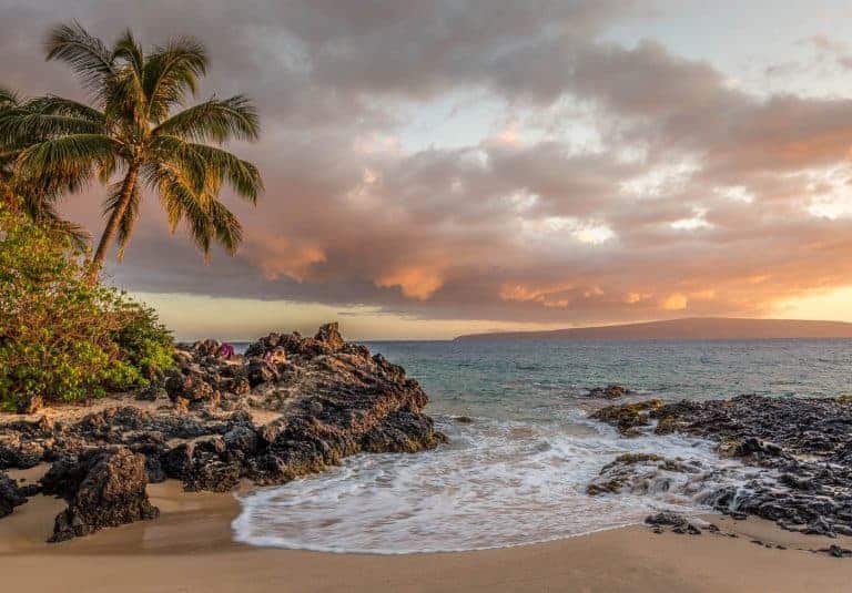 hawaii lava rock beach at sunset