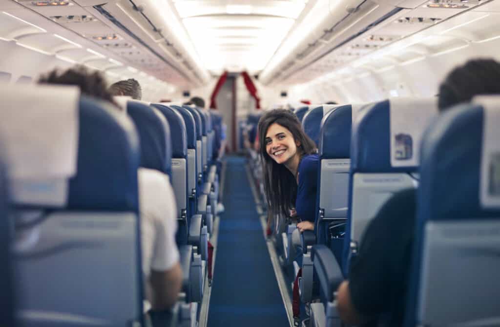 airplane passenger in an aisle seat