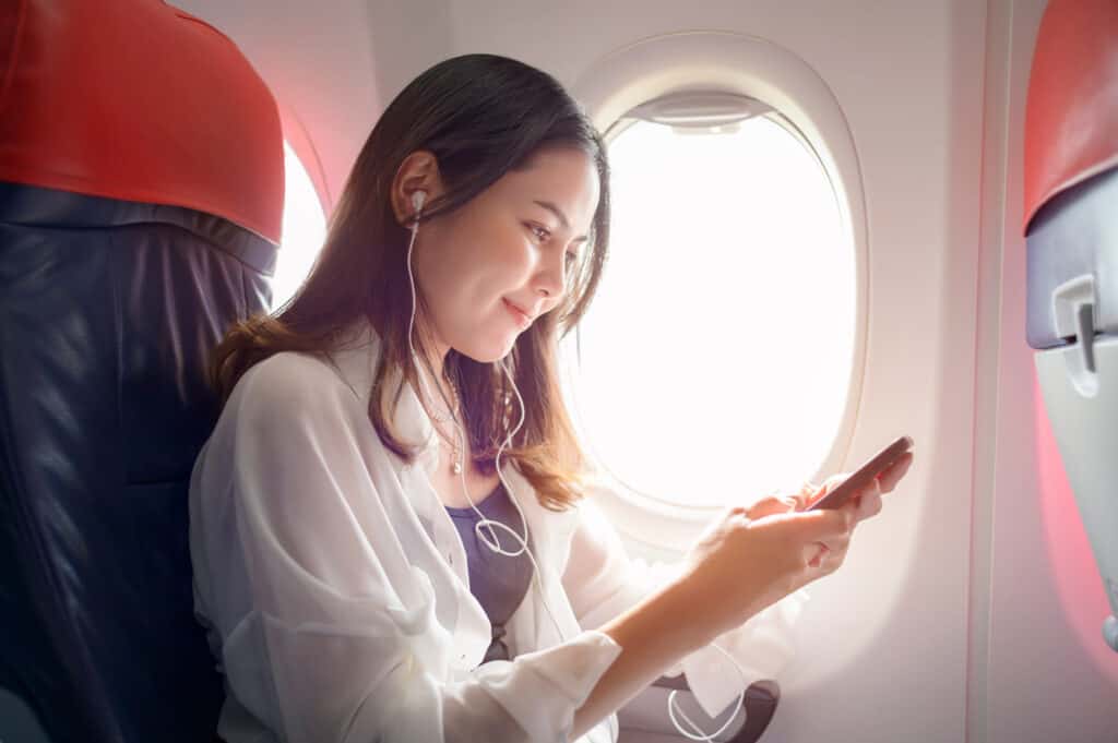 female passenger on an airplane