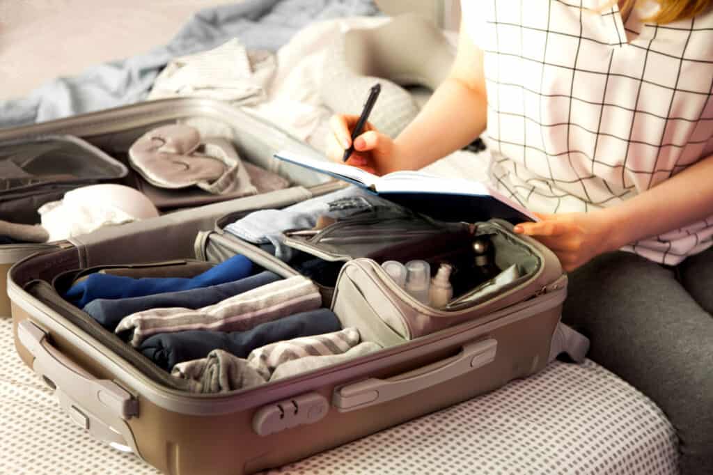 Can you pack water in checked luggage hot sale