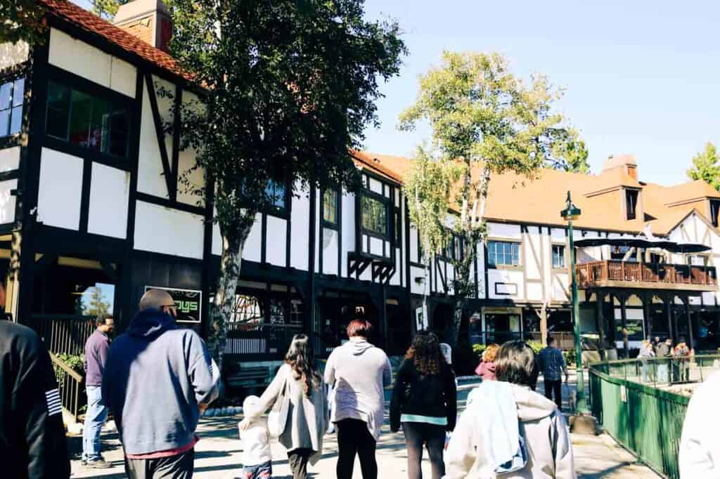 tourists stroll down the Main Street on lake arrowhead village