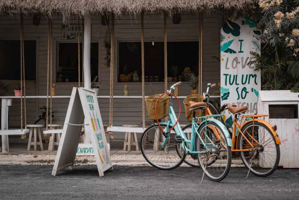 bicycles parked outside a smoothie bar in Tulum mexico