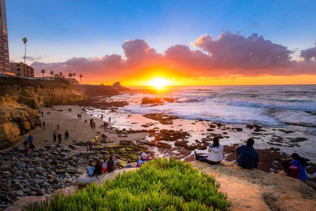 Tourists watching the beautifal sunset at La Jolla, San Diego, CA
