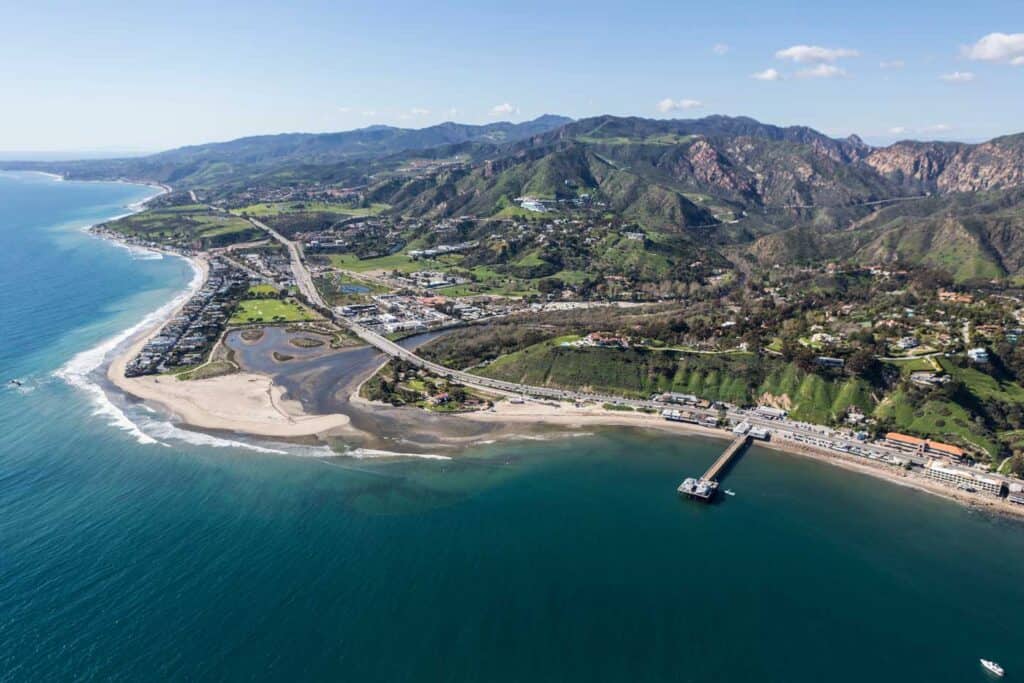 Aerial view of Malibu Pier and Surfrider Beach near Los Angeles, California.